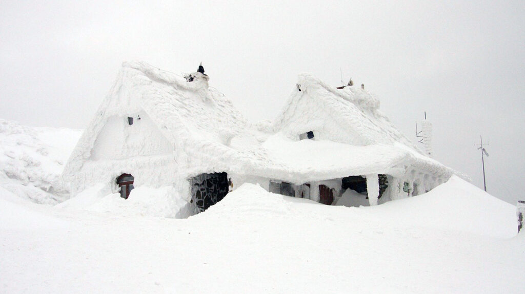 Snow buried house