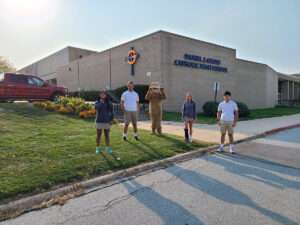 Students in front of Gross Catholic's Campus building