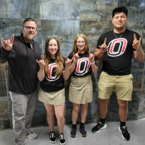 Scholarship winners and their teacher