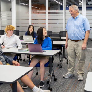 Mr. Hamersky helps student achieve high test scores.